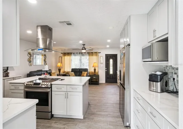 Photo 3 of Single family home for sale at 1123 Hampton St, Clermont, FL 34711 | MLS# O6445462 | Listing updated on 2026-10-22