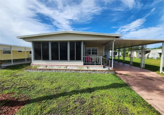 Photo 1 of Manufactured home for sale at 5408 Chateau Ln, Bradenton, FL 34207 | MLS# A4707725 | Listing updated on 2026-10-06