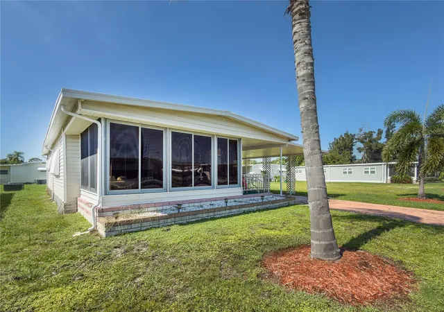 Photo 1 of Manufactured home for sale at 5408 Chateau Ln, Bradenton, FL 34207 | MLS# A4707725 | Listing updated on 2026-10-16