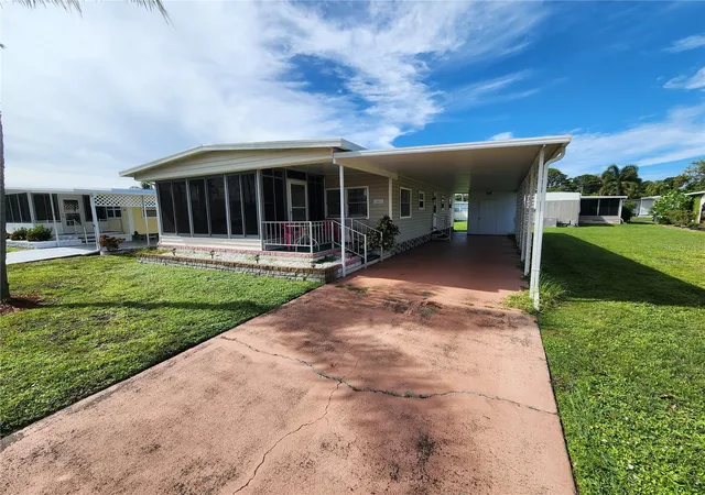 Photo 2 of Manufactured home for sale at 5408 Chateau Ln, Bradenton, FL 34207 | MLS# A4707725 | Listing updated on 2026-10-06