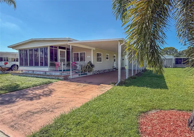Photo 2 of Manufactured home for sale at 5408 Chateau Ln, Bradenton, FL 34207 | MLS# A4707725 | Listing updated on 2026-10-16