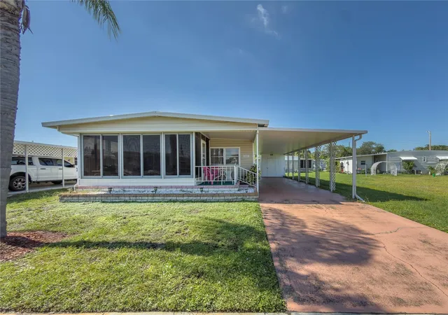 Photo 3 of Manufactured home for sale at 5408 Chateau Ln, Bradenton, FL 34207 | MLS# A4707725 | Listing updated on 2026-10-16