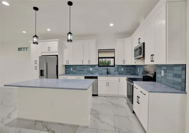 Photo 3 of Single family home for sale at 2725 W Green St, Tampa, FL 33607 | MLS# TB8552930 | Listing updated on 2026-10-08