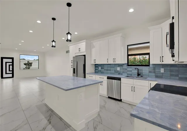 Photo 3 of Single family home for sale at 2725 W Green St, Tampa, FL 33607 | MLS# TB8552930 | Listing updated on 2026-10-08