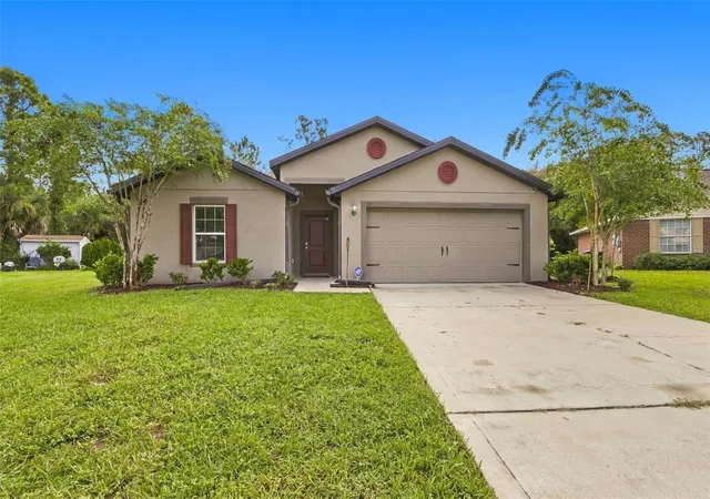 Photo 1 of Single family home for sale at 71 Royal Oak Dr, Palm Coast, FL 32164 | MLS# O6445467 | Listing updated on 2026-10-04