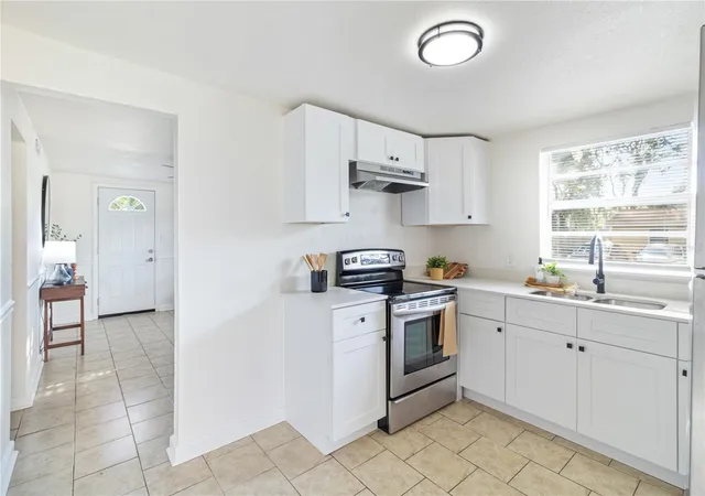 Photo 3 of Single family home for sale at 1410 E 98th Avenue, Tampa, FL 33612 | MLS# TB8552947 | Listing updated on 2026-10-04