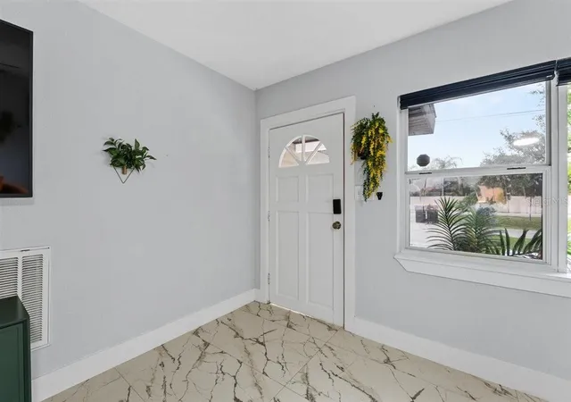 Photo 3 of Single family home for sale at 8120 Gondola Dr, Orlando, FL 32809 | MLS# O6445501 | Listing updated on 2026-09-29