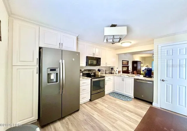 Photo 3 of Condo for sale at 1 Tomoka Oaks Blvd #119, Ormond Beach, FL 32174 | MLS# V4951555 | Listing updated on 2026-09-29