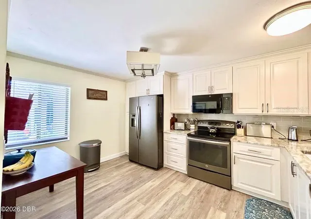 Photo 4 of Condo for sale at 1 Tomoka Oaks Blvd #119, Ormond Beach, FL 32174 | MLS# V4951555 | Listing updated on 2026-09-29