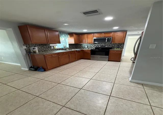 Photo 3 of Single family home for sale at 7325 Ivanhoe Dr, Port Richey, FL 34668 | MLS# TB8552971 | Listing updated on 2026-10-05