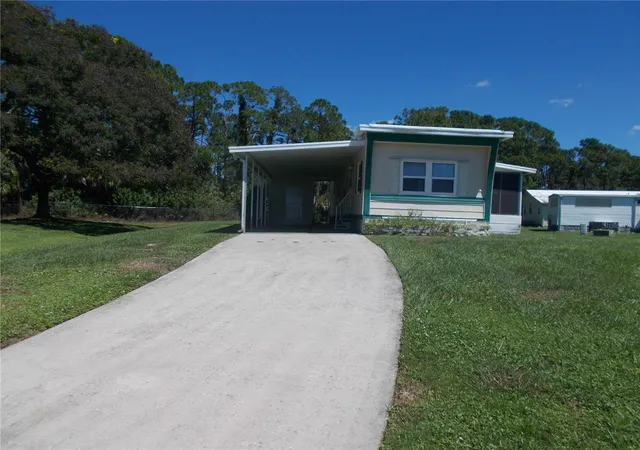 Photo 2 of Manufactured home for sale at 6384 Charm Ct, North Port, FL 34287 | MLS# C7531323 | Listing updated on 2026-10-02