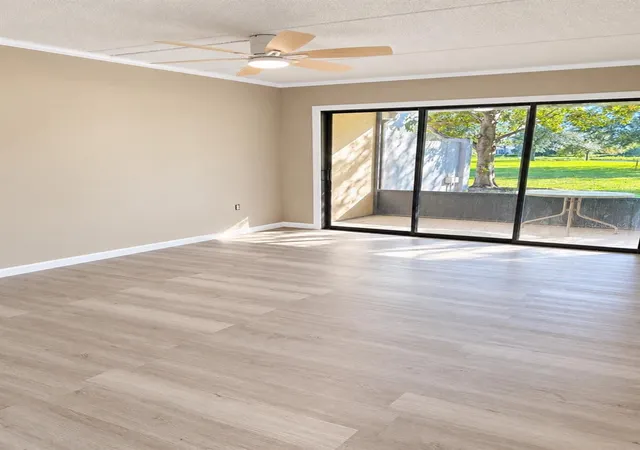 Photo 2 of Condo for sale at 5228 Cypress Crk Dr #105, Orlando, FL 32811 | MLS# O6445550 | Listing updated on 2026-09-30