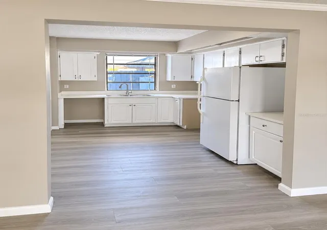 Photo 3 of Condo for sale at 5228 Cypress Crk Dr #105, Orlando, FL 32811 | MLS# O6445550 | Listing updated on 2026-09-30