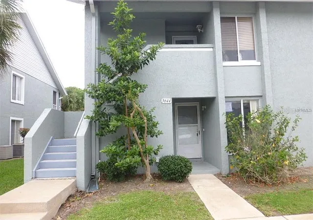 Photo 1 of Condo for sale at 5644 Blue Shadows Ct #65-2, Orlando, FL 32811 | MLS# O6445576 | Listing updated on 2026-09-29