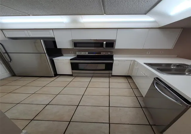 Photo 3 of Condo for sale at 5644 Blue Shadows Ct #65-2, Orlando, FL 32811 | MLS# O6445576 | Listing updated on 2026-09-29