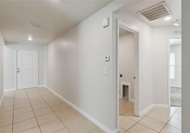 Photo 3 of Single family home for sale at 1694 Hideaway Flt St, Mascotte, FL 34753 | MLS# O6445589 | Listing updated on 2026-10-02