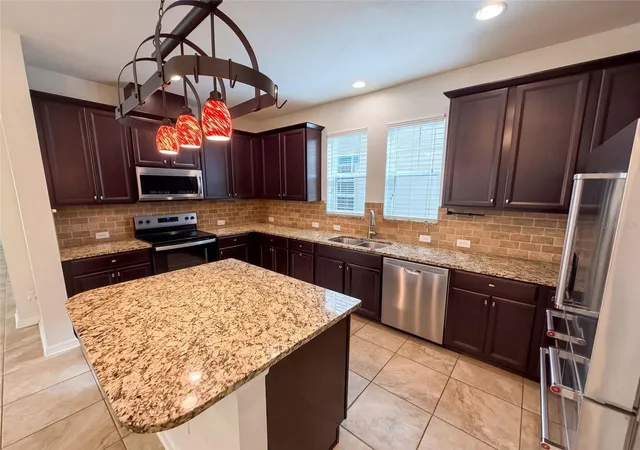 Photo 3 of Single family home for sale at 8231 Laureate Blvd, Orlando, FL 32827 | MLS# O6445629 | Listing updated on 2026-10-08