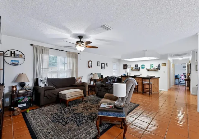 Photo 3 of Single family home for sale at 12394 SE 139th Avenue, Ocklawaha, FL 32179 | MLS# TB8553051 | Listing updated on 2026-10-09