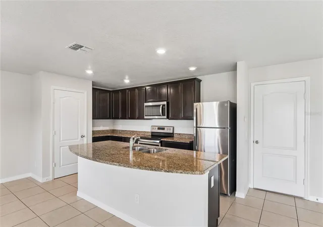 Photo 4 of Single family home for sale at 2513 Caspian Dr, Lakeland, FL 33805 | MLS# TB8553078 | Listing updated on 2026-10-03