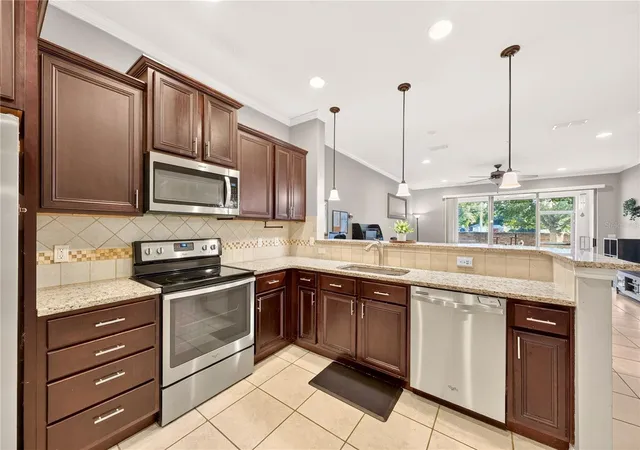 Photo 2 of Townhouse for sale at 10867 Corsican St #20, Orlando, FL 32824 | MLS# O6445748 | Listing updated on 2026-09-30