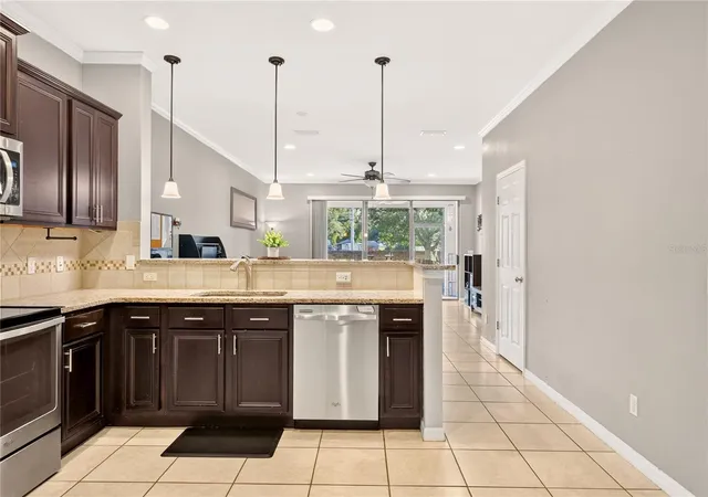Photo 3 of Townhouse for sale at 10867 Corsican St #20, Orlando, FL 32824 | MLS# O6445748 | Listing updated on 2026-09-30