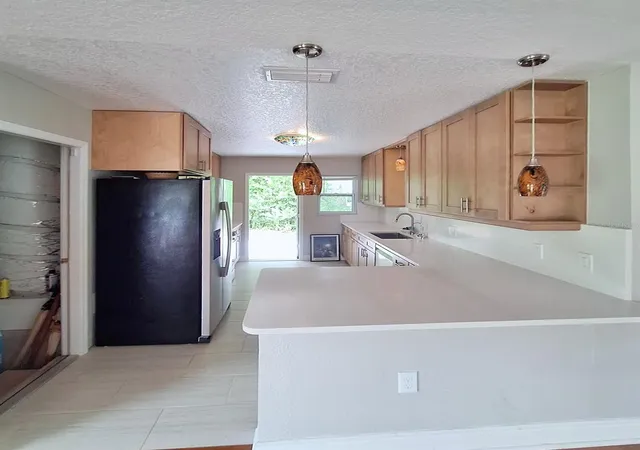 Photo 4 of Single family home for sale at 1670 N Page Dr, Deltona, FL 32725 | MLS# O6445760 | Listing updated on 2026-10-04