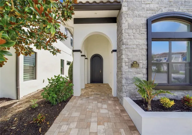 Photo 3 of Single family home for sale at 1051 Jack Nicklaus Ct, Kissimmee, FL 34747 | MLS# O6445767 | Listing updated on 2026-10-01
