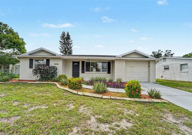 Photo 1 of Single family home for sale at 9035 Saint Regis Ln, Port Richey, FL 34668 | MLS# O6445773 | Listing updated on 2026-10-05