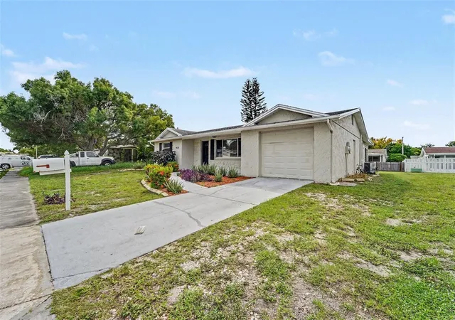 Photo 3 of Single family home for sale at 9035 Saint Regis Ln, Port Richey, FL 34668 | MLS# O6445773 | Listing updated on 2026-10-05