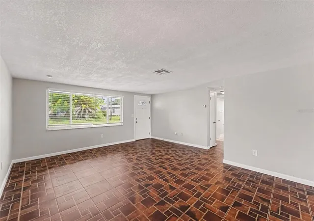 Photo 3 of Single family home for sale at 9035 Saint Regis Ln, Port Richey, FL 34668 | MLS# O6445773 | Listing updated on 2026-10-05