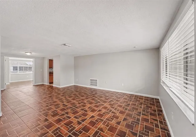 Photo 4 of Single family home for sale at 9035 Saint Regis Ln, Port Richey, FL 34668 | MLS# O6445773 | Listing updated on 2026-10-05