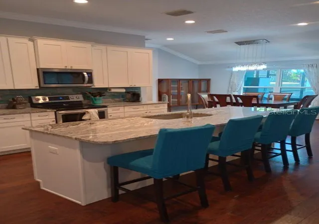 Photo 3 of Single family home for sale at 427 Carolina Ave, Lady Lake, FL 32159 | MLS# O6445801 | Listing updated on 2026-10-09