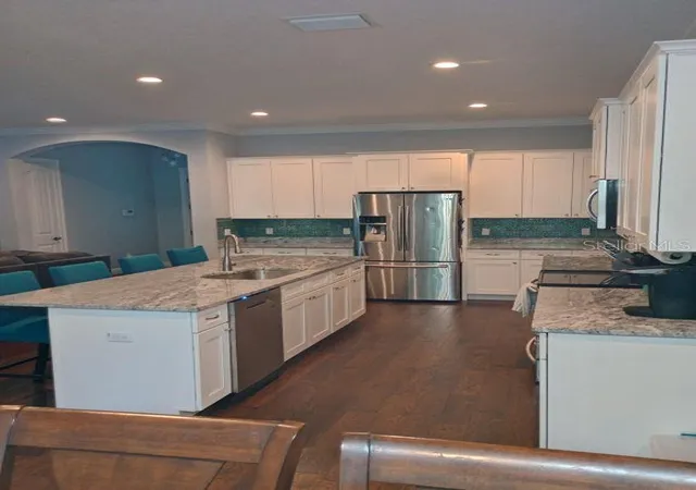 Photo 4 of Single family home for sale at 427 Carolina Ave, Lady Lake, FL 32159 | MLS# O6445801 | Listing updated on 2026-10-09