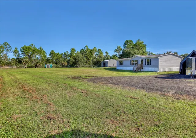 Photo 3 of Manufactured home for sale at 4123 Hidden Lakes Dr, Mims, FL 32754 | MLS# O6445841 | Listing updated on 2026-09-30