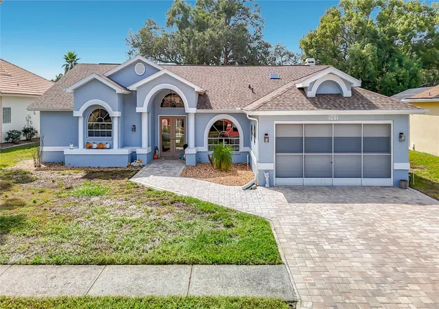 Photo 2 of Single family home for sale at 1051 Hook Dr, Spring Hill, FL 34608 | MLS# W7889914 | Listing updated on 2026-10-03