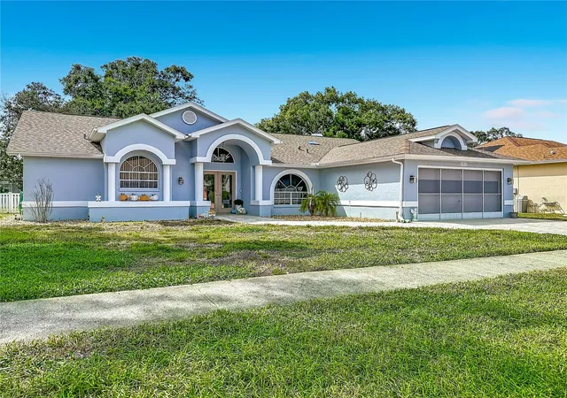 Photo 3 of Single family home for sale at 1051 Hook Dr, Spring Hill, FL 34608 | MLS# W7889914 | Listing updated on 2026-10-03