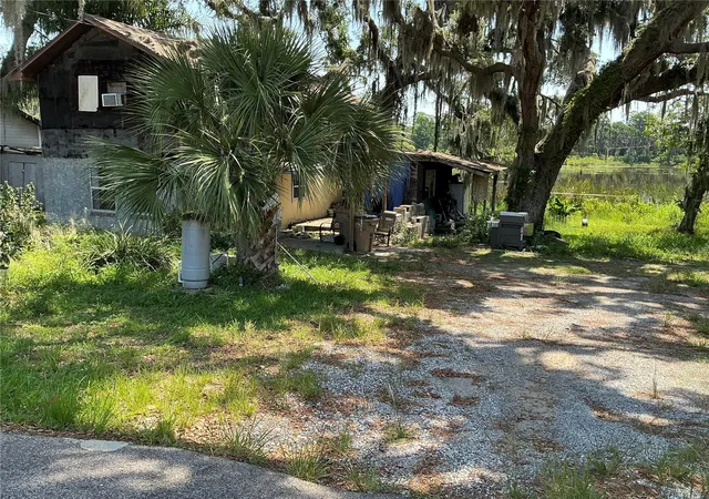 Photo 2 of Single family home for sale at 15100 Timber Village Rd, Groveland, FL 34736 | MLS# S5158504 | Listing updated on 2026-10-08
