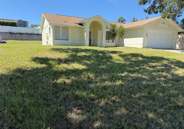 Photo 2 of Single family home for sale at 400 Ashbourne Dr, Orlando, FL 32835 | MLS# O6445904 | Listing updated on 2026-09-30