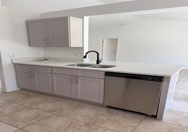 Photo 3 of Single family home for sale at 400 Ashbourne Dr, Orlando, FL 32835 | MLS# O6445904 | Listing updated on 2026-09-30