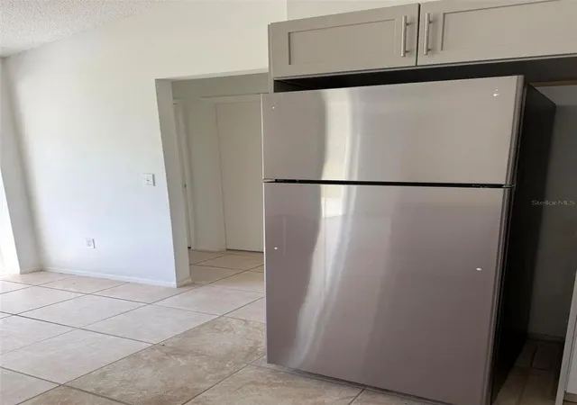 Photo 4 of Single family home for sale at 400 Ashbourne Dr, Orlando, FL 32835 | MLS# O6445904 | Listing updated on 2026-09-30