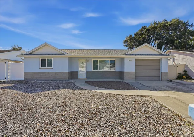 Photo 1 of Single family home for sale at 7420 Sandalwood Dr, Port Richey, FL 34668 | MLS# TB8553258 | Listing updated on 2026-10-07