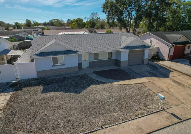 Photo 2 of Single family home for sale at 7420 Sandalwood Dr, Port Richey, FL 34668 | MLS# TB8553258 | Listing updated on 2026-10-07