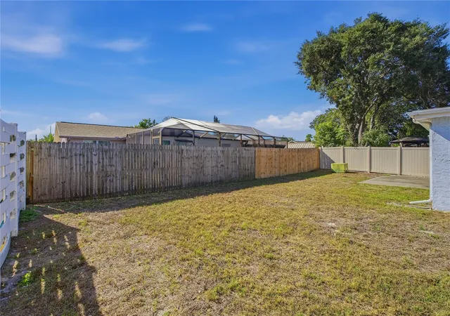 Photo 3 of Single family home for sale at 7420 Sandalwood Dr, Port Richey, FL 34668 | MLS# TB8553258 | Listing updated on 2026-10-07