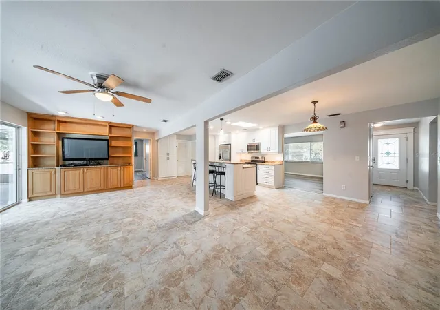 Photo 3 of Single family home for sale at 1966 Spanish Oaks Dr N, Palm Harbor, FL 34683 | MLS# TB8553267 | Listing updated on 2026-10-08