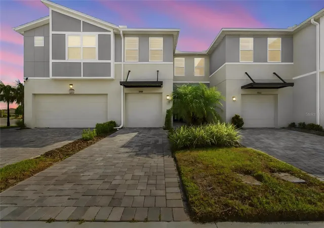 Photo 1 of Townhouse for sale at 31564 Woodland Race Loop, Wesley Chapel, FL 33545 | MLS# TB8553277 | Listing updated on 2026-10-09