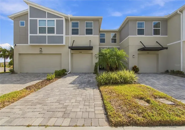 Photo 2 of Townhouse for sale at 31564 Woodland Race Loop, Wesley Chapel, FL 33545 | MLS# TB8553277 | Listing updated on 2026-10-09