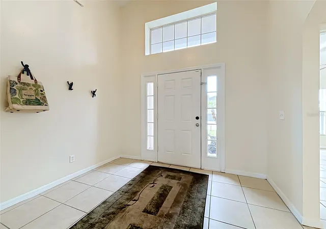 Photo 3 of Single family home for sale at 1406 Vista Del Lago Blvd, Dundee, FL 33838 | MLS# P4940029 | Listing updated on 2026-10-07