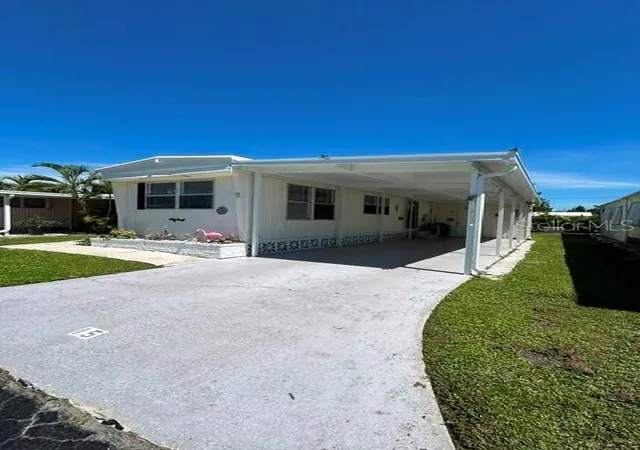Photo 2 of Manufactured home for sale at 15 Mary Lu Mhp #15, Port Charlotte, FL 33980 | MLS# C7531377 | Listing updated on 2026-09-30