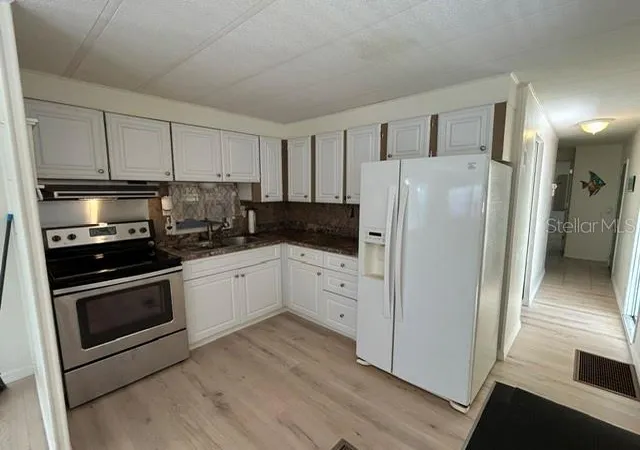 Photo 4 of Manufactured home for sale at 15 Mary Lu Mhp #15, Port Charlotte, FL 33980 | MLS# C7531377 | Listing updated on 2026-09-30