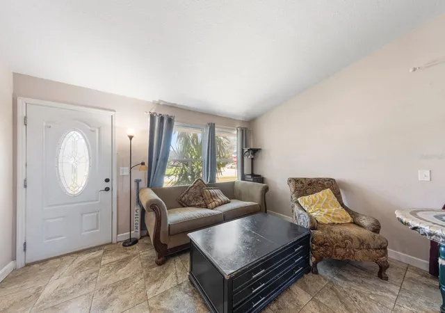 Photo 3 of Single family home for sale at 1679 Needles Ln W, Largo, FL 33771 | MLS# TB8553356 | Listing updated on 2026-10-07
